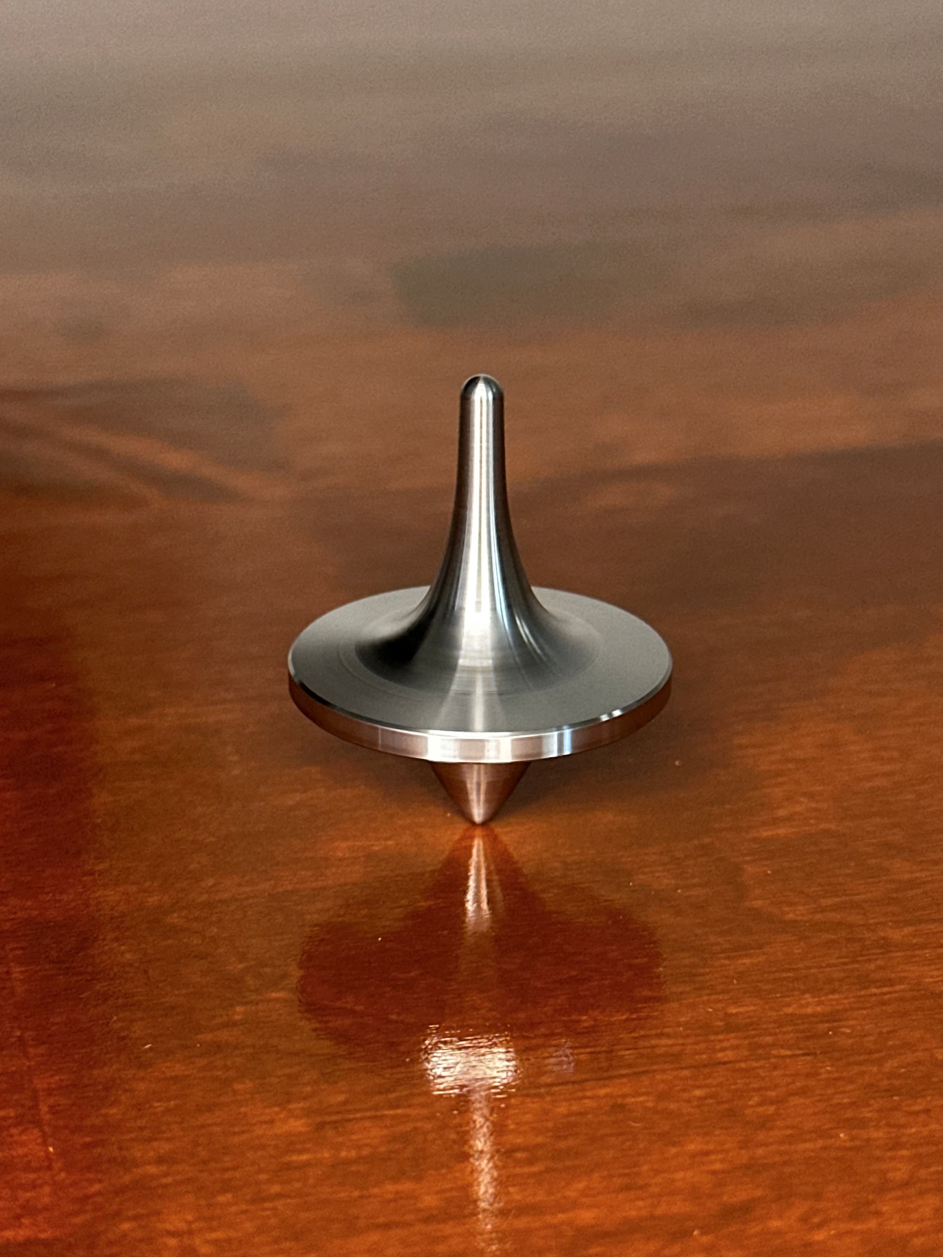 Stainless Steel Spinning Top and Holder | CNC Machined Fidget Desk Toy
