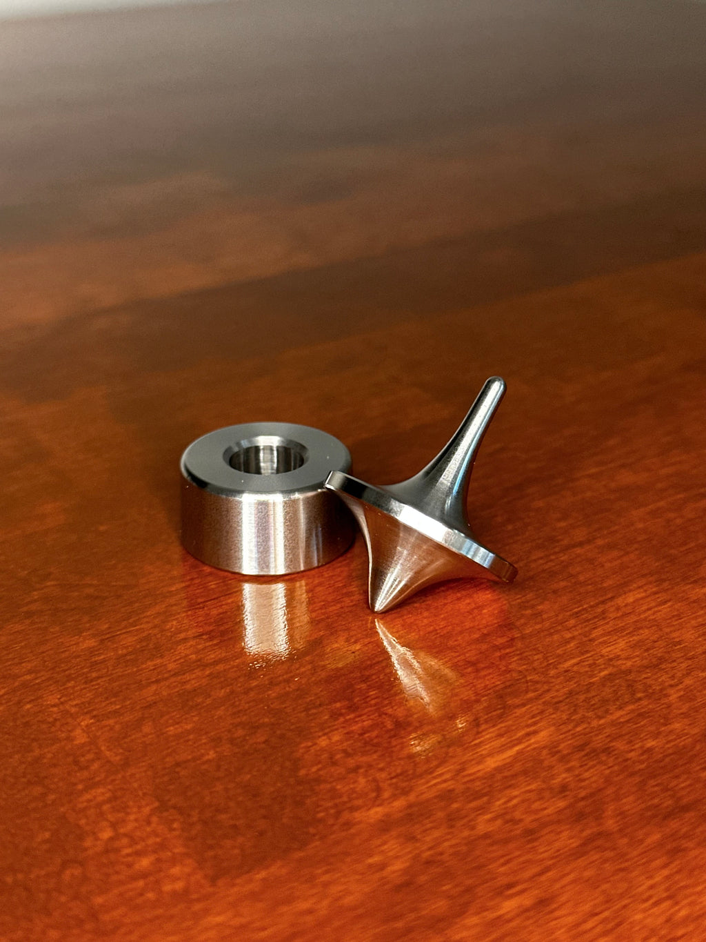 Stainless Steel Spinning Top and Holder | CNC Machined Fidget Desk Toy